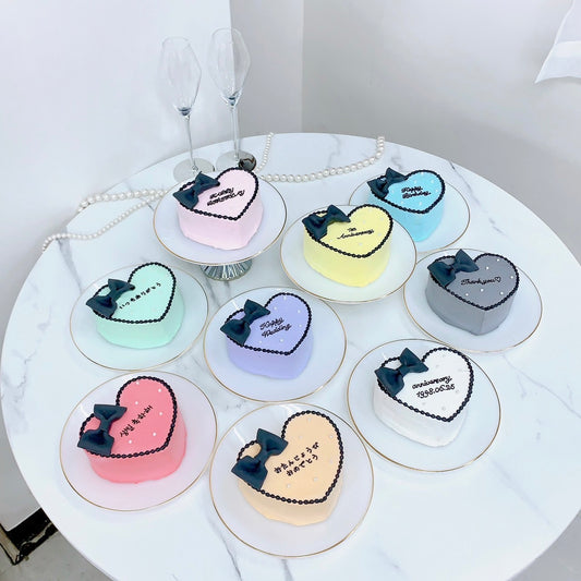 ハート型黒リボンセンイルケーキ