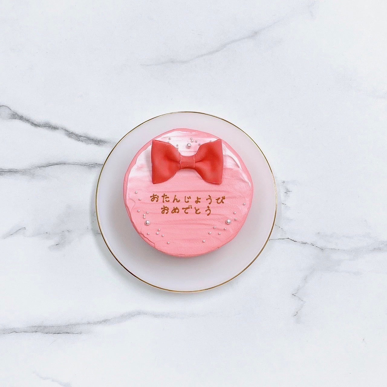 リボン付きセンイルケーキ