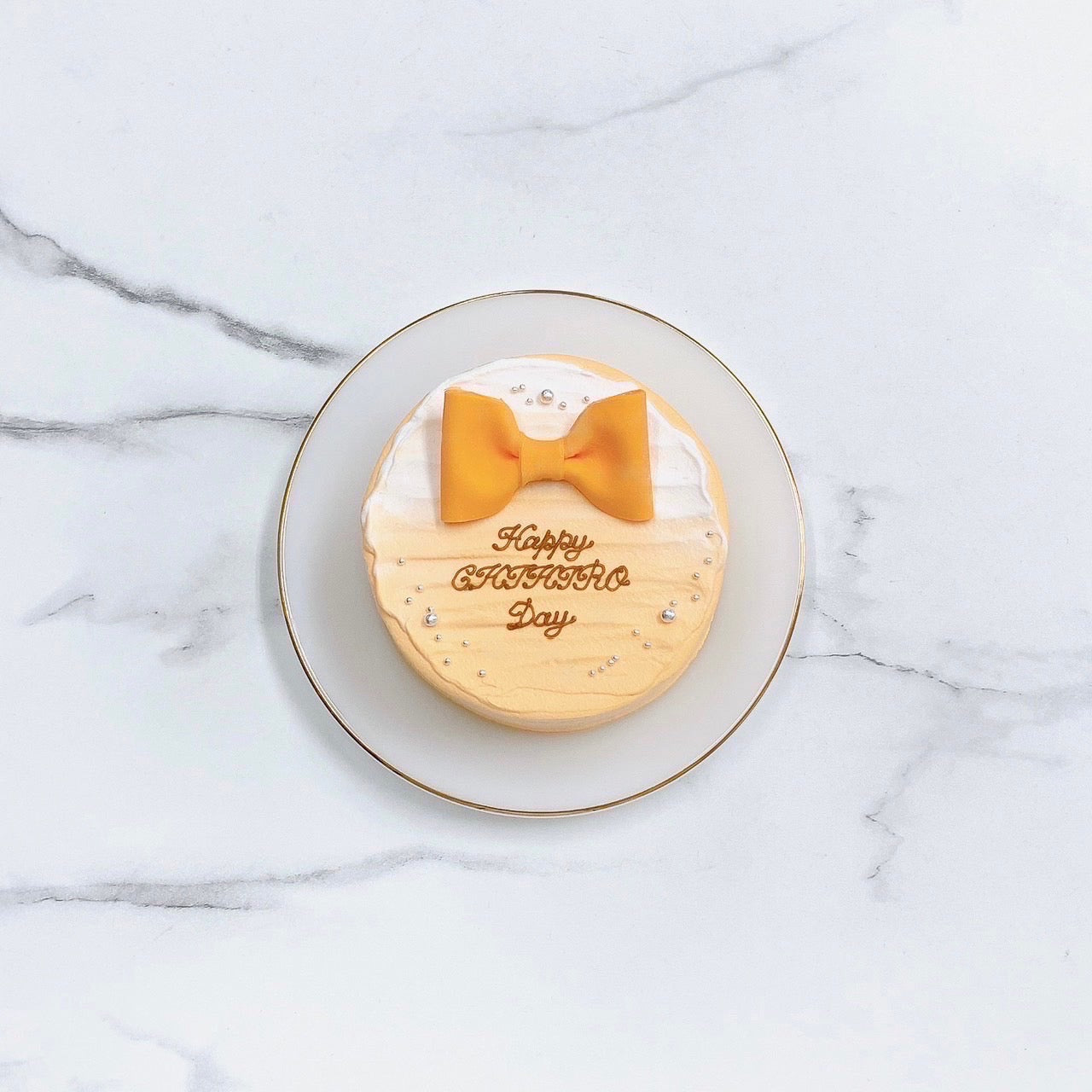 リボン付きセンイルケーキ