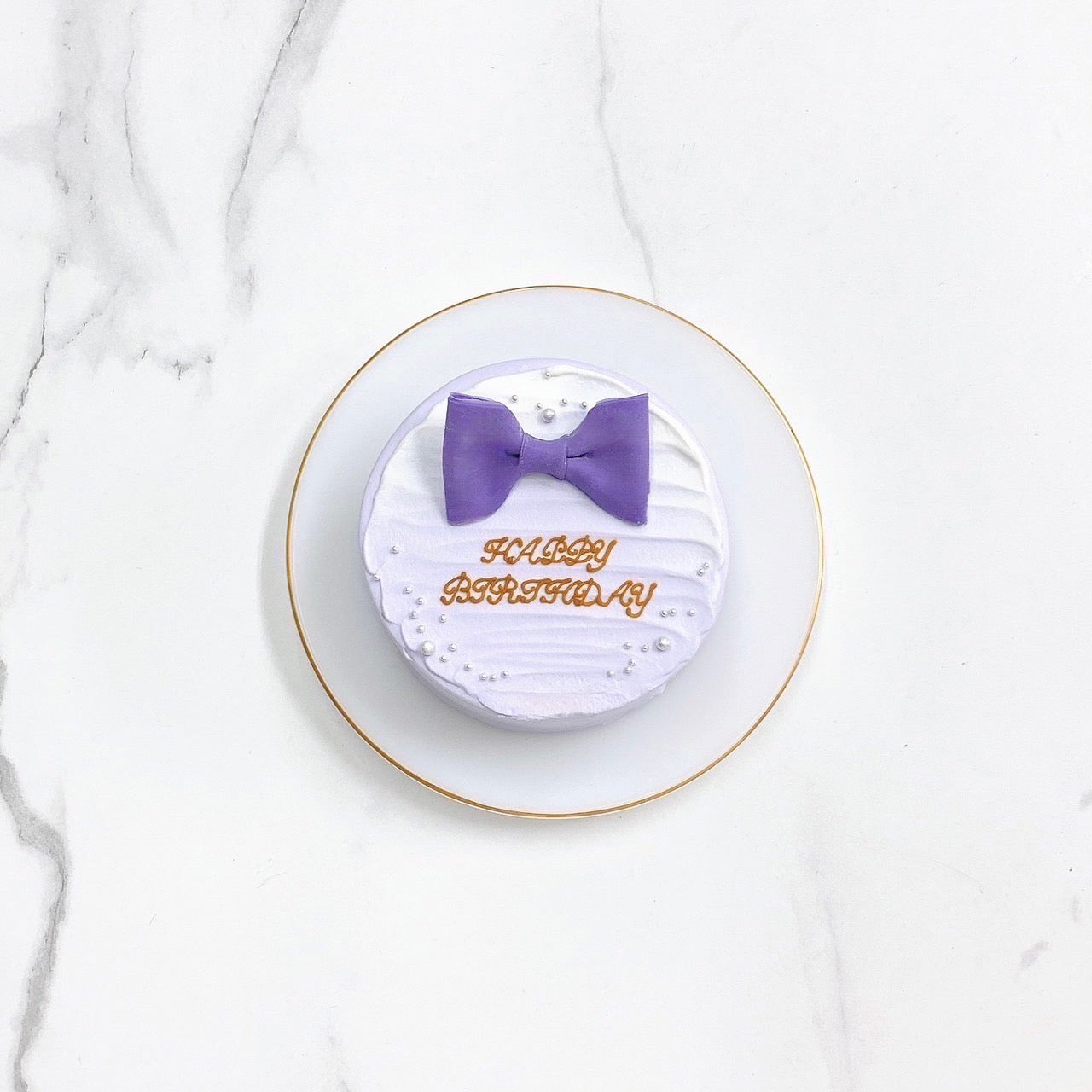 リボン付きセンイルケーキ