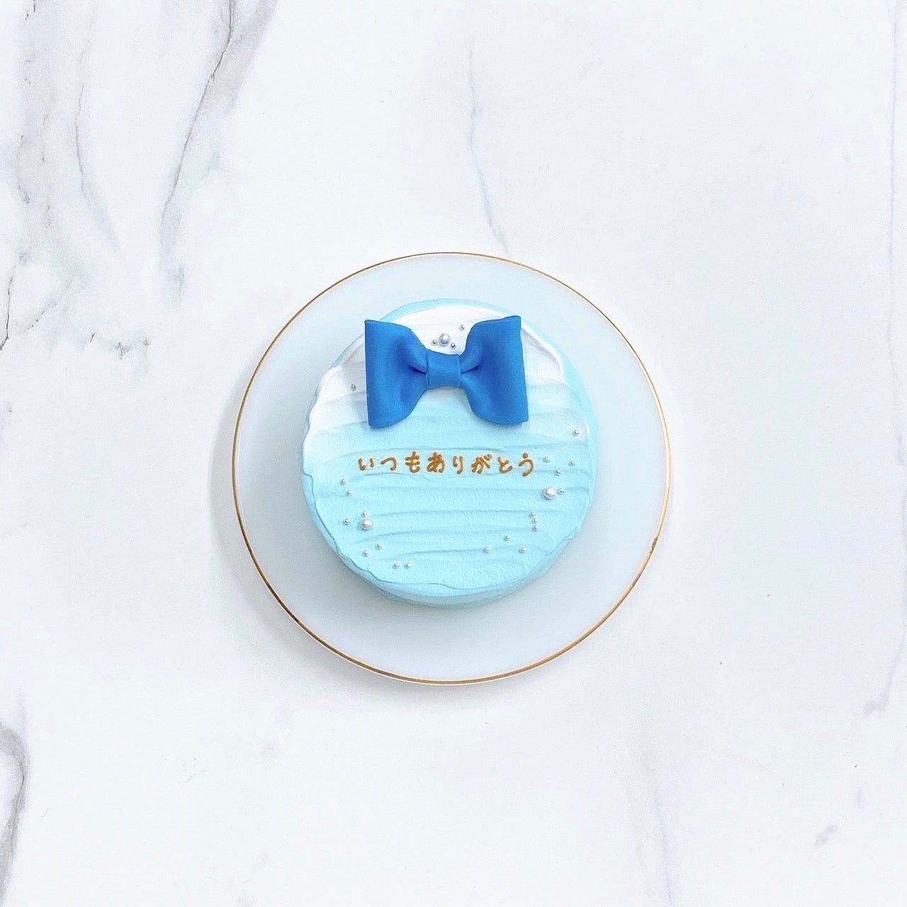 リボン付きセンイルケーキ