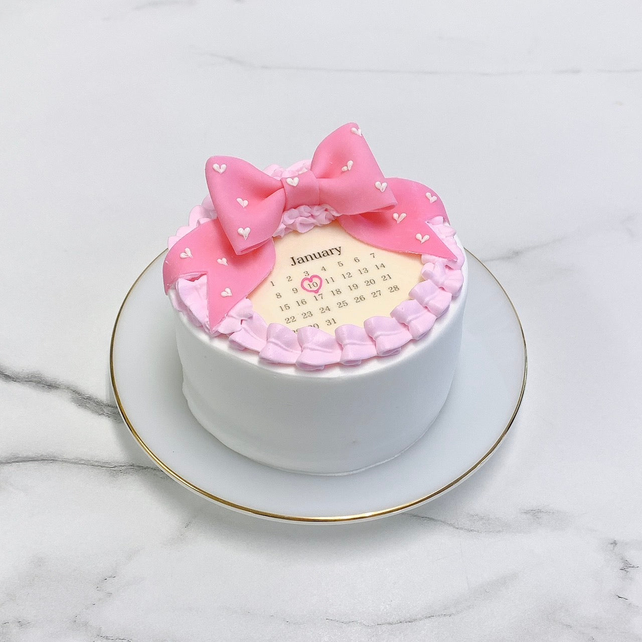 丸型カレンダー ハートドット柄リボンケーキ