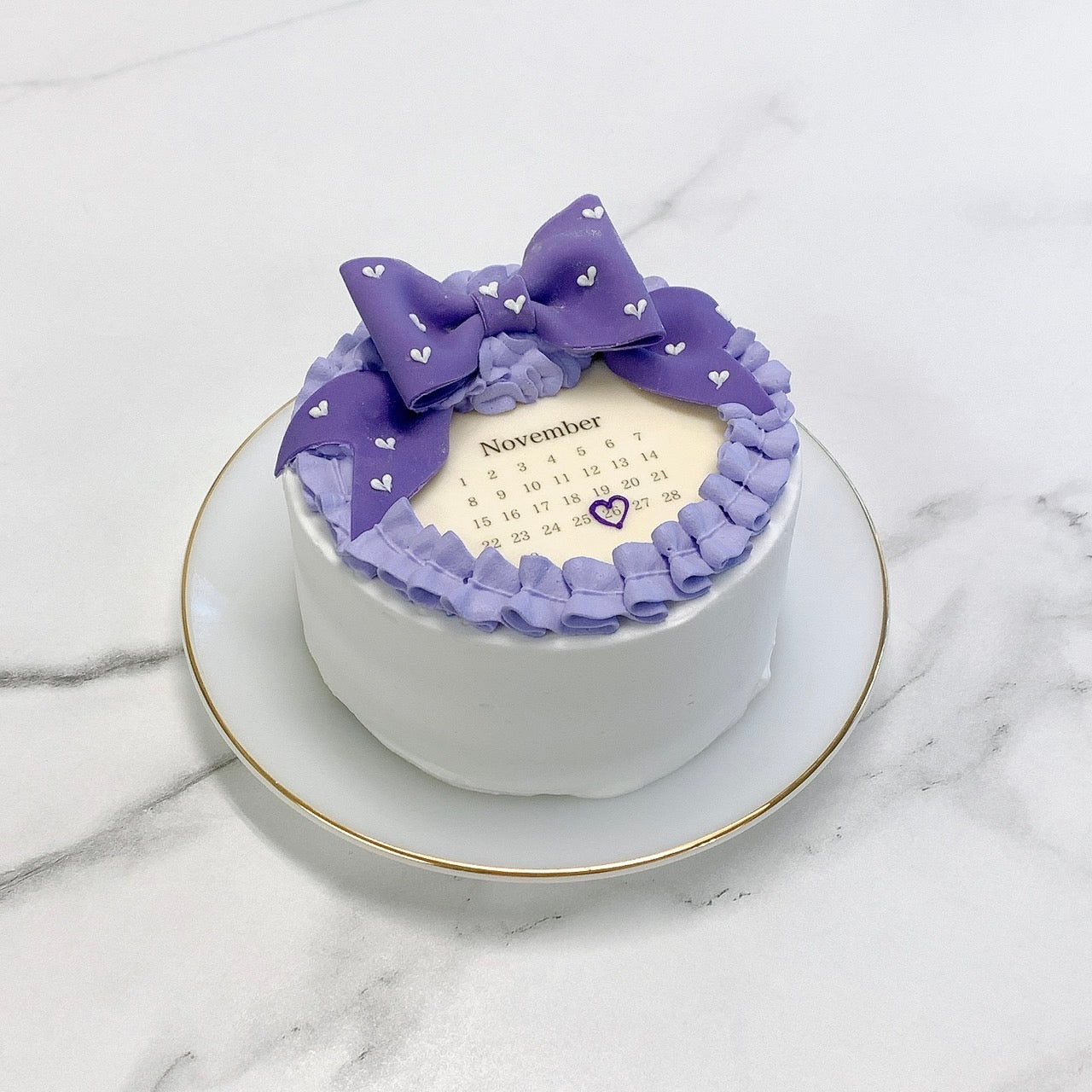 丸型カレンダー ハートドット柄リボンケーキ