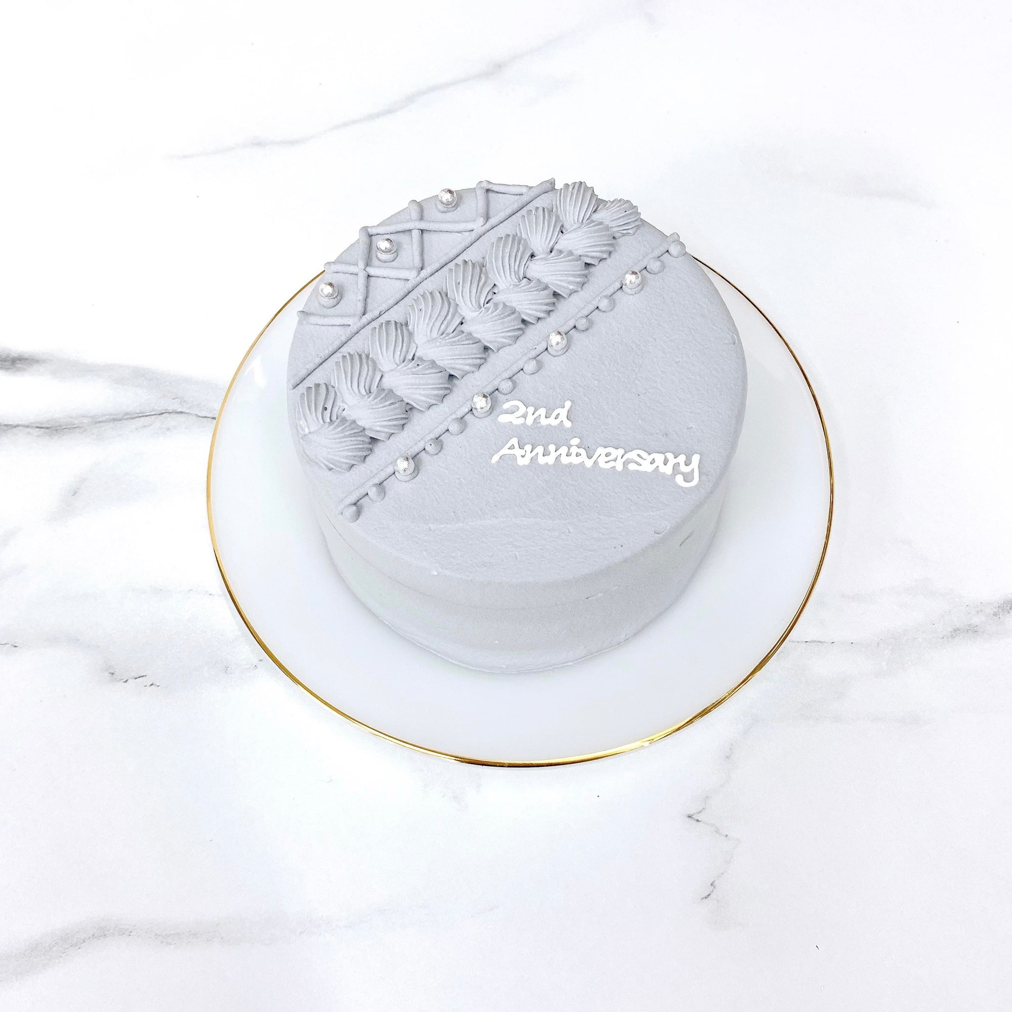 ケーブルニットセンイルケーキ