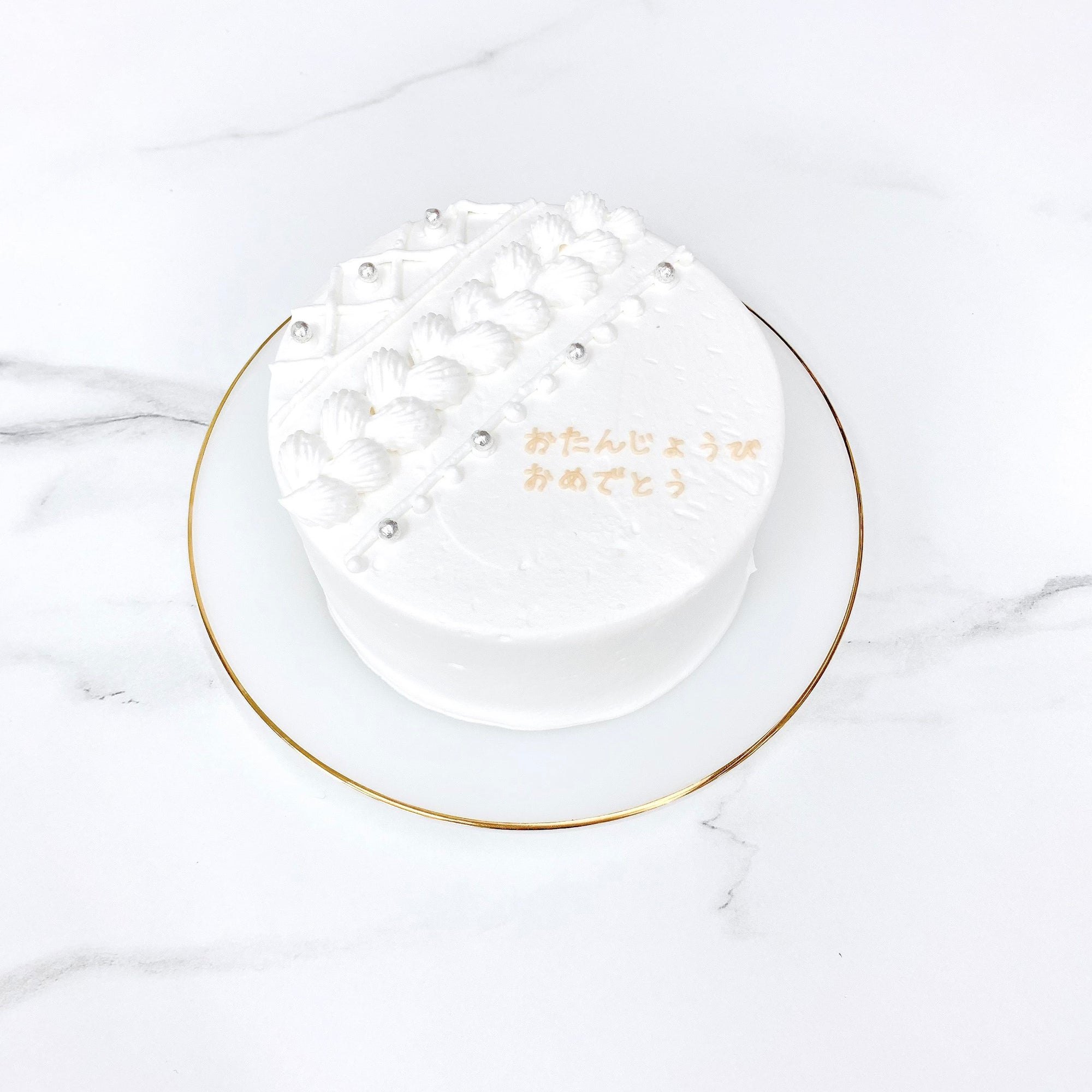 ケーブルニットセンイルケーキ